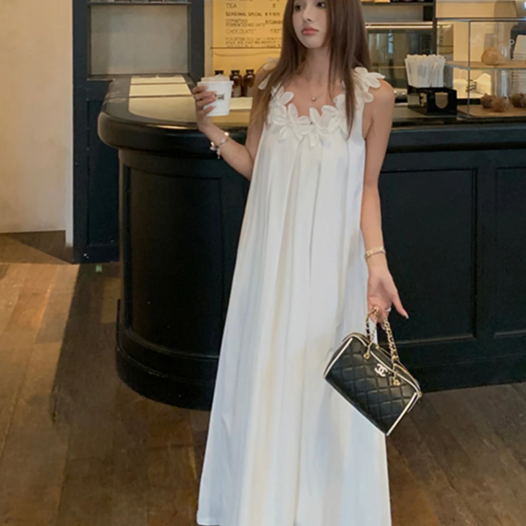 独特漂亮立体花朵连衣裙女夏季新款减龄轻奢气质慵懒风吊带长裙子
