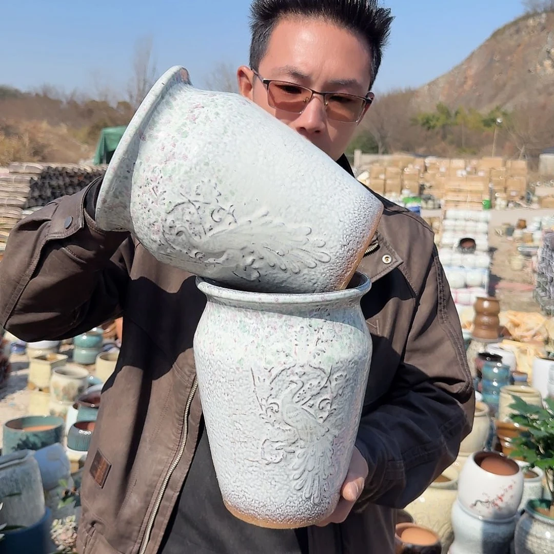 紫砂花盆口17高23（两个孔雀彩色武