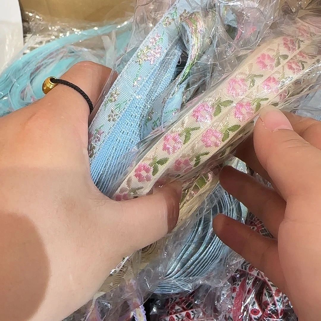 倪**工服装辅料花边织带