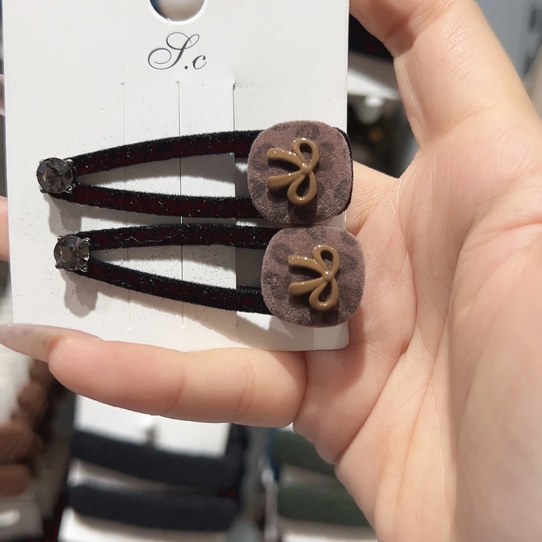 非金属仿珍珠蝴蝶结豹纹鸭夹