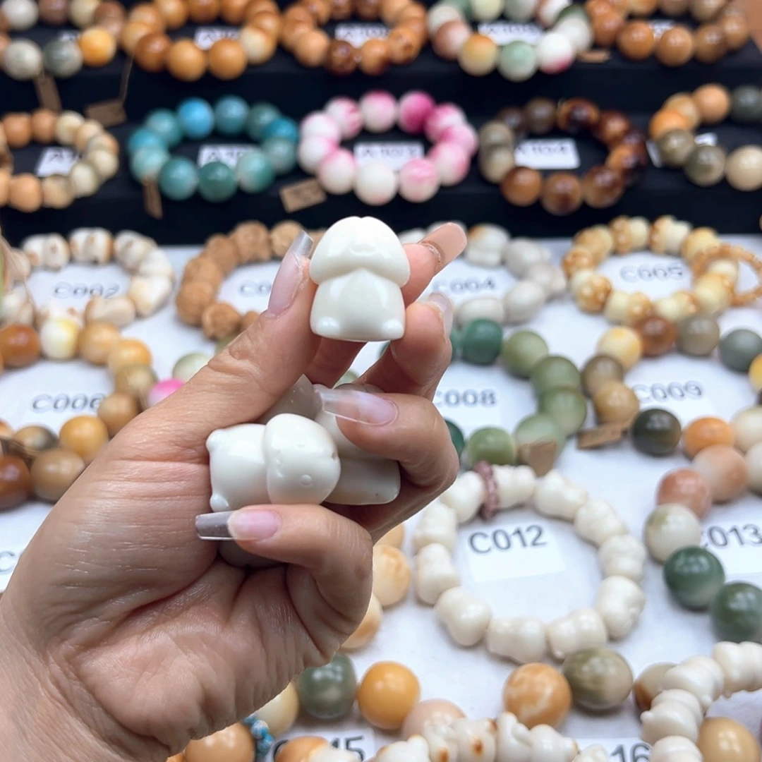 白玉菩提吊坠瑕疵拿不出手的串串