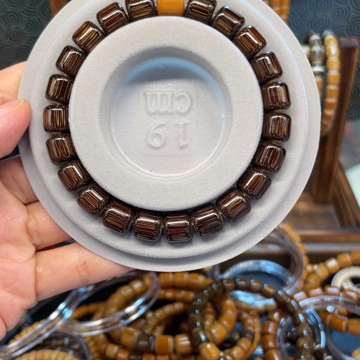 竹山*岚0.9实心金丝棕竹手串