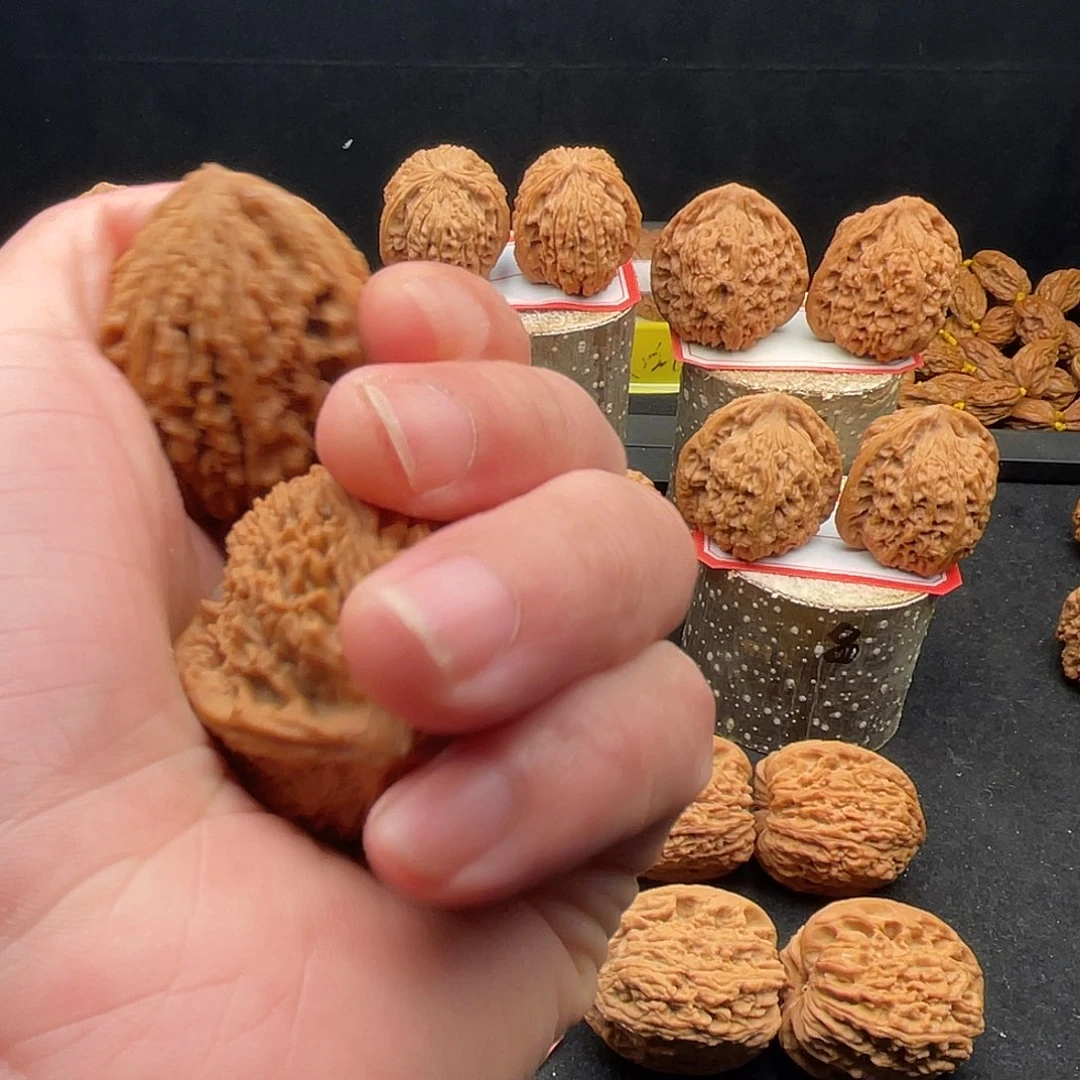 文玩核桃把件b****?南疆核桃手把件文玩