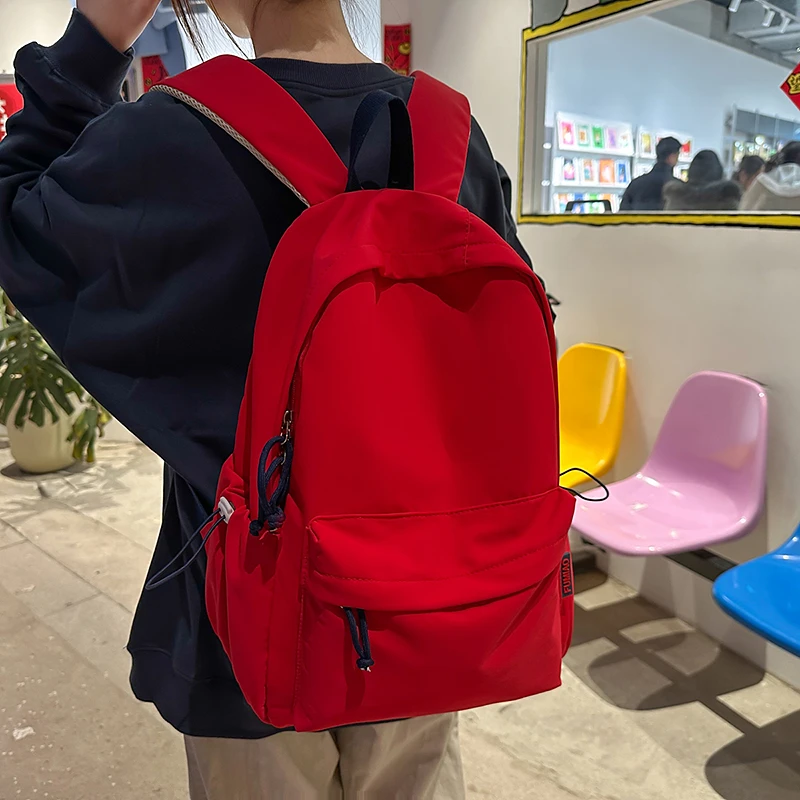 印花透气护脊拉链耐磨竖款双肩包休闲大学生韩版森系ins风