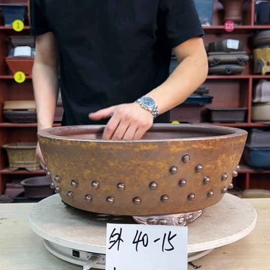 明**庄紫砂花盆中香气浓美