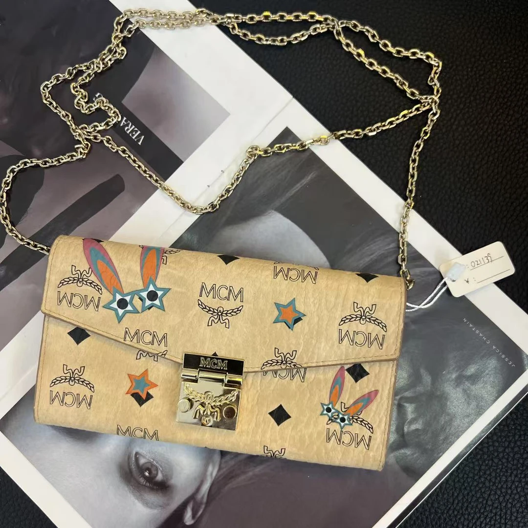 99新 MCM 大麦中古/mcm 兔子涂鸦米白色woc/斜挎包