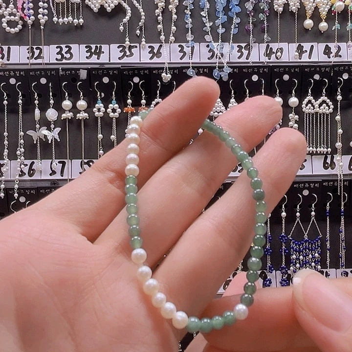 小***6银S925镶嵌淡水珍珠耳饰