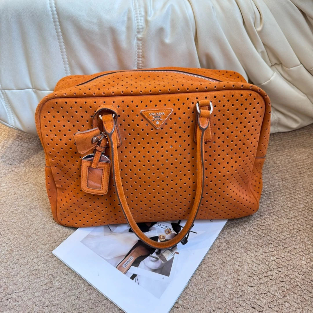95新 Prada/普拉达 橙色麂皮 镂空手提公文包631473188