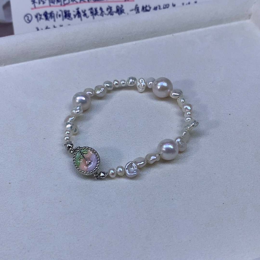 鲤***淼淡水珍珠耳饰合金特价手链178