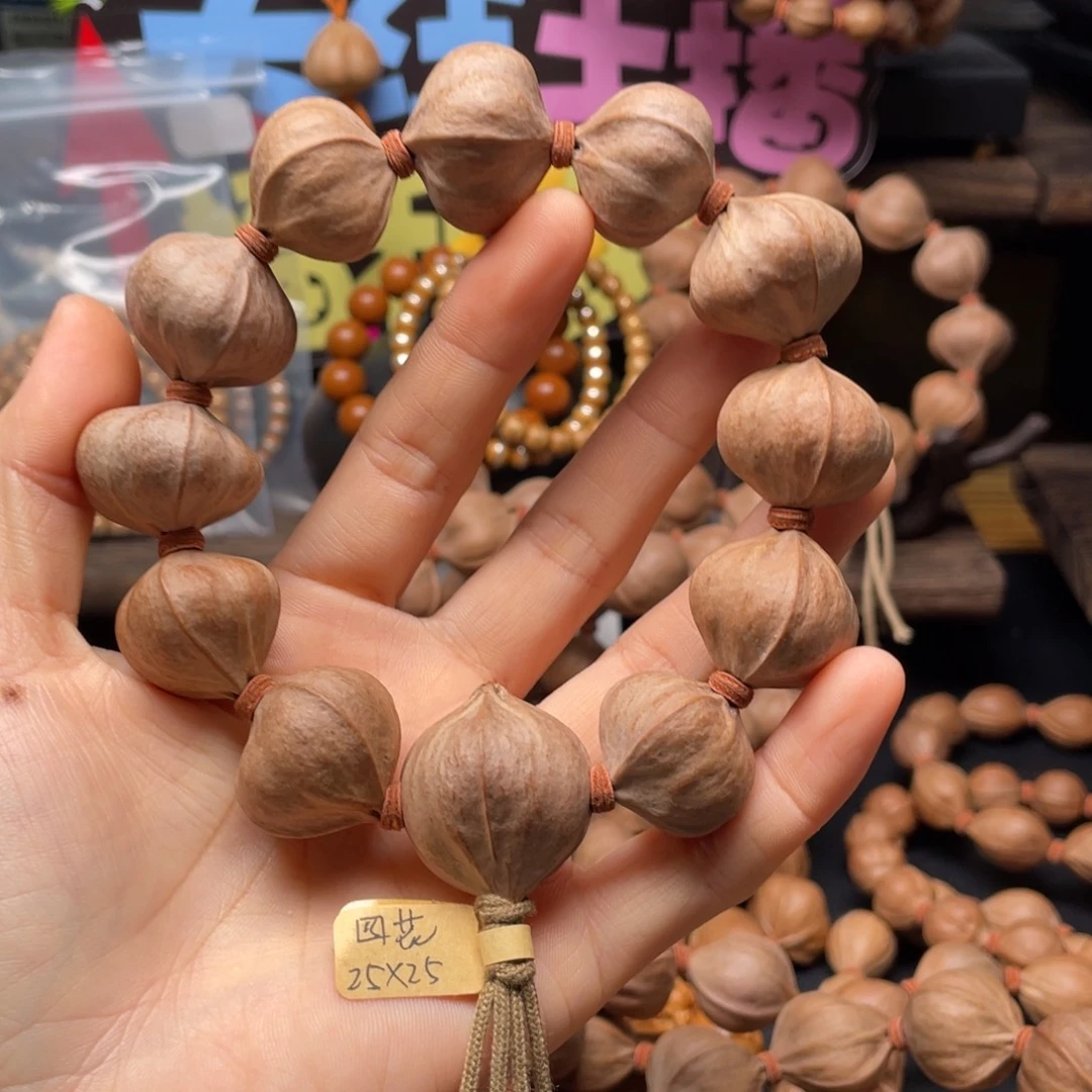 L***六橄榄核吊坠2525四花铁核