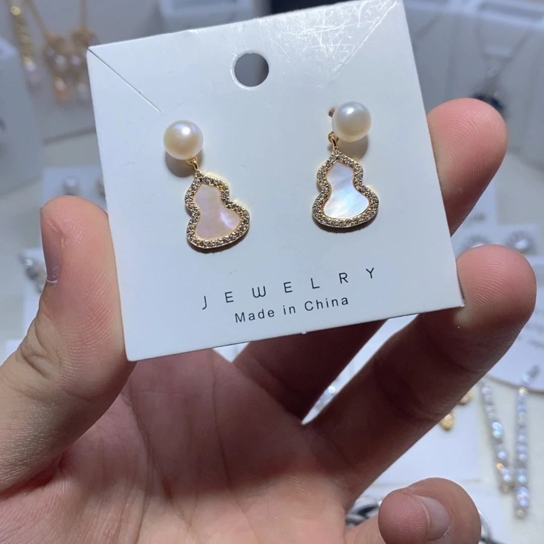 淡水珍珠银S925镶嵌耳饰