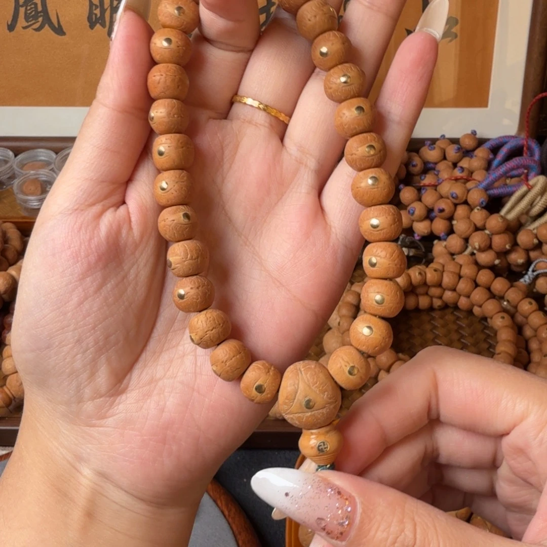 凤眼菩提把件精工藏式/11mm/27颗手持/铜钉