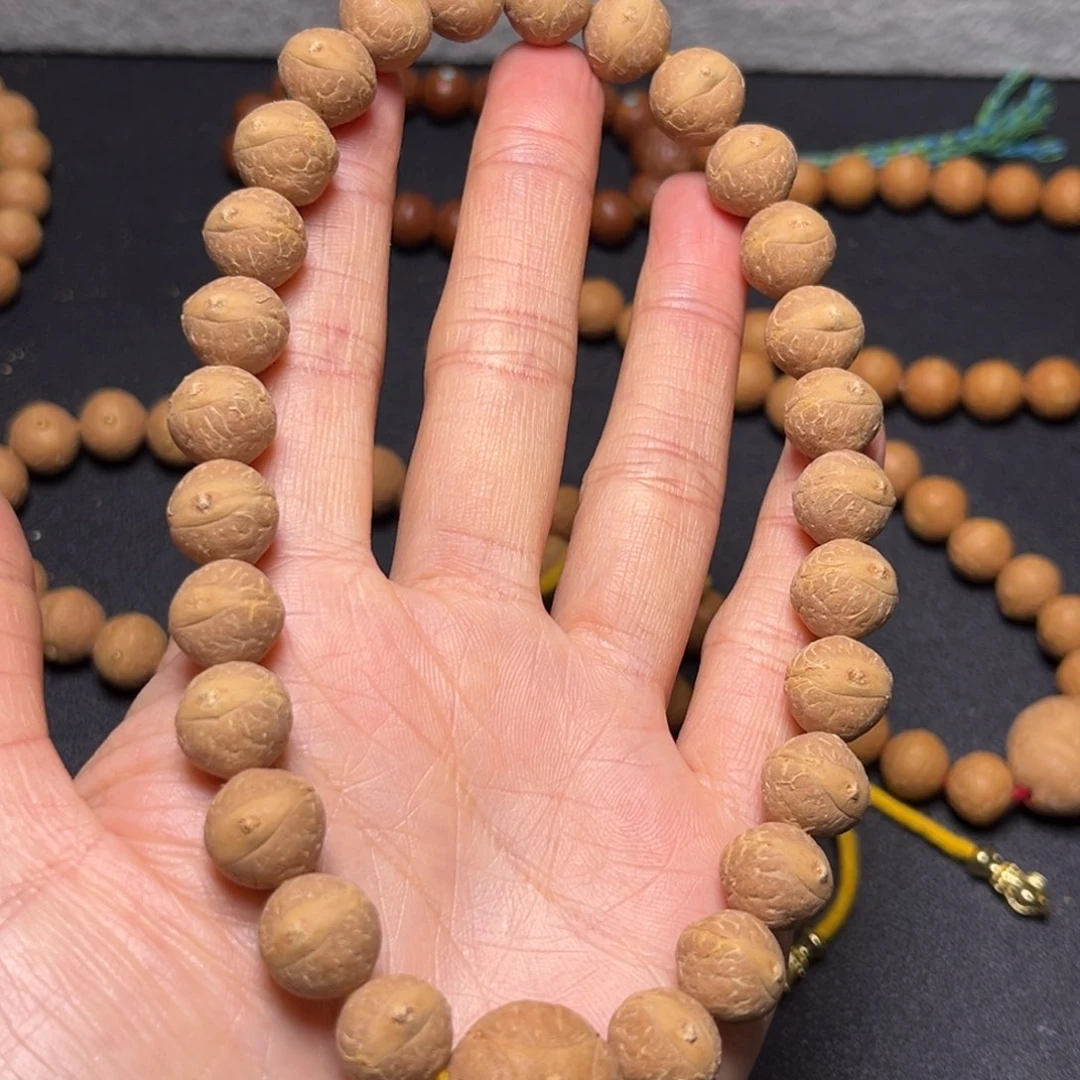 凤眼菩提吊坠段****)11.5mm实心27颗手持