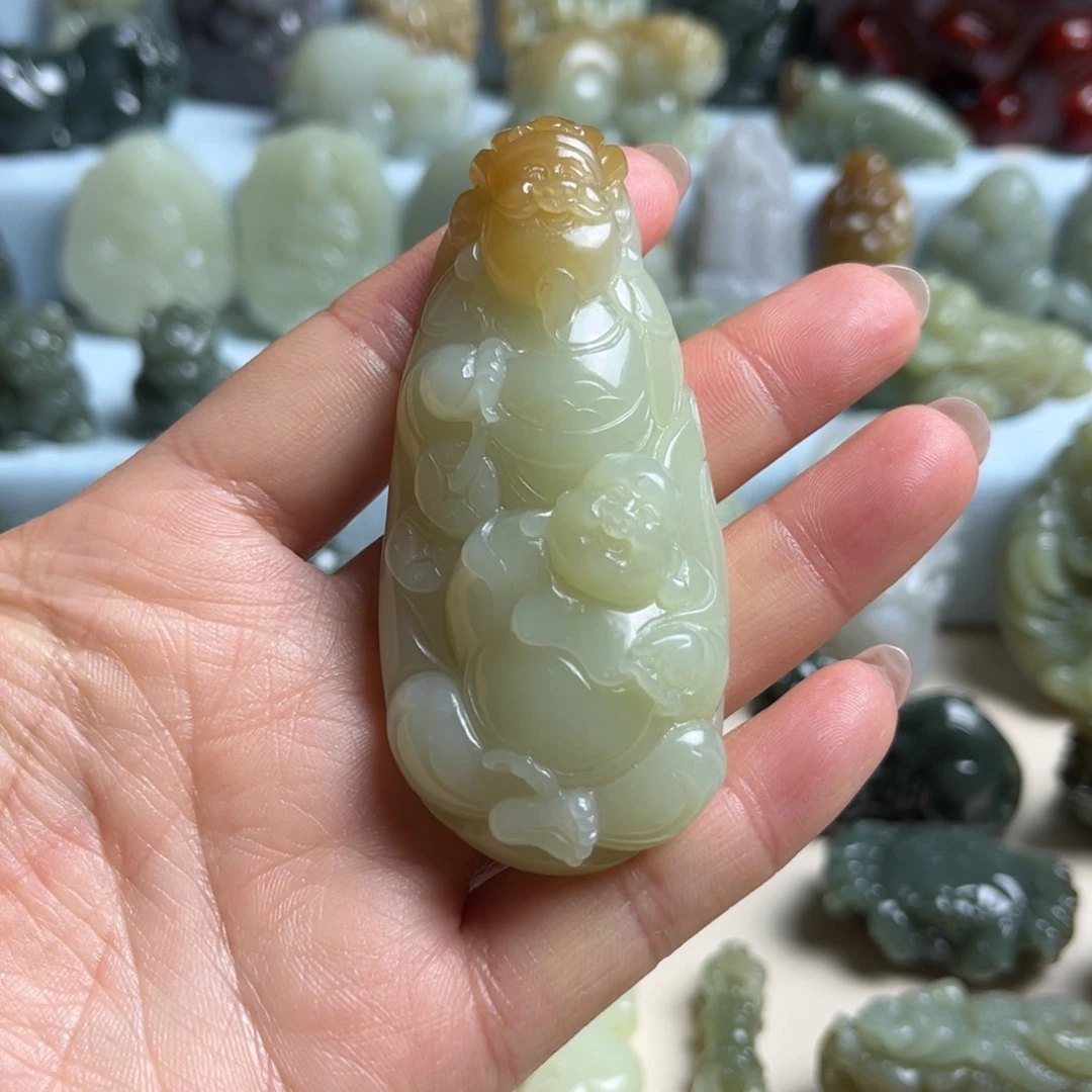 小***哥和田玉未镶嵌把件