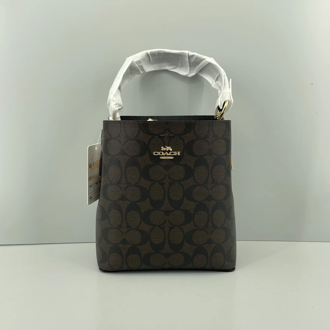 99新 COACH/蔻驰 town黑拼老花斜挎水桶包 20*21*10cmD123004