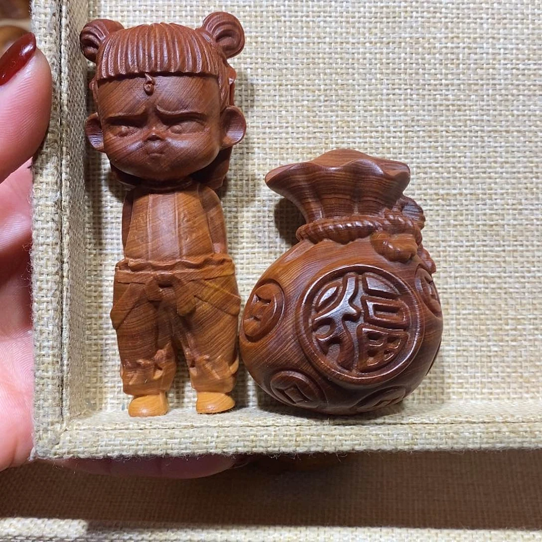 木赵***?崖柏手把件，哪吒，福袋