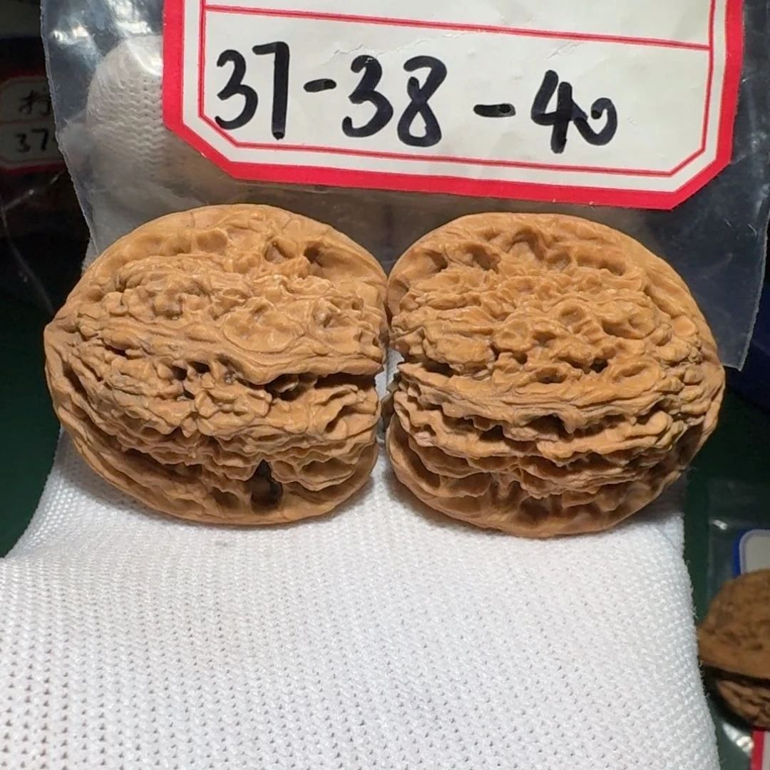 文玩核桃把件57号拧花高炮