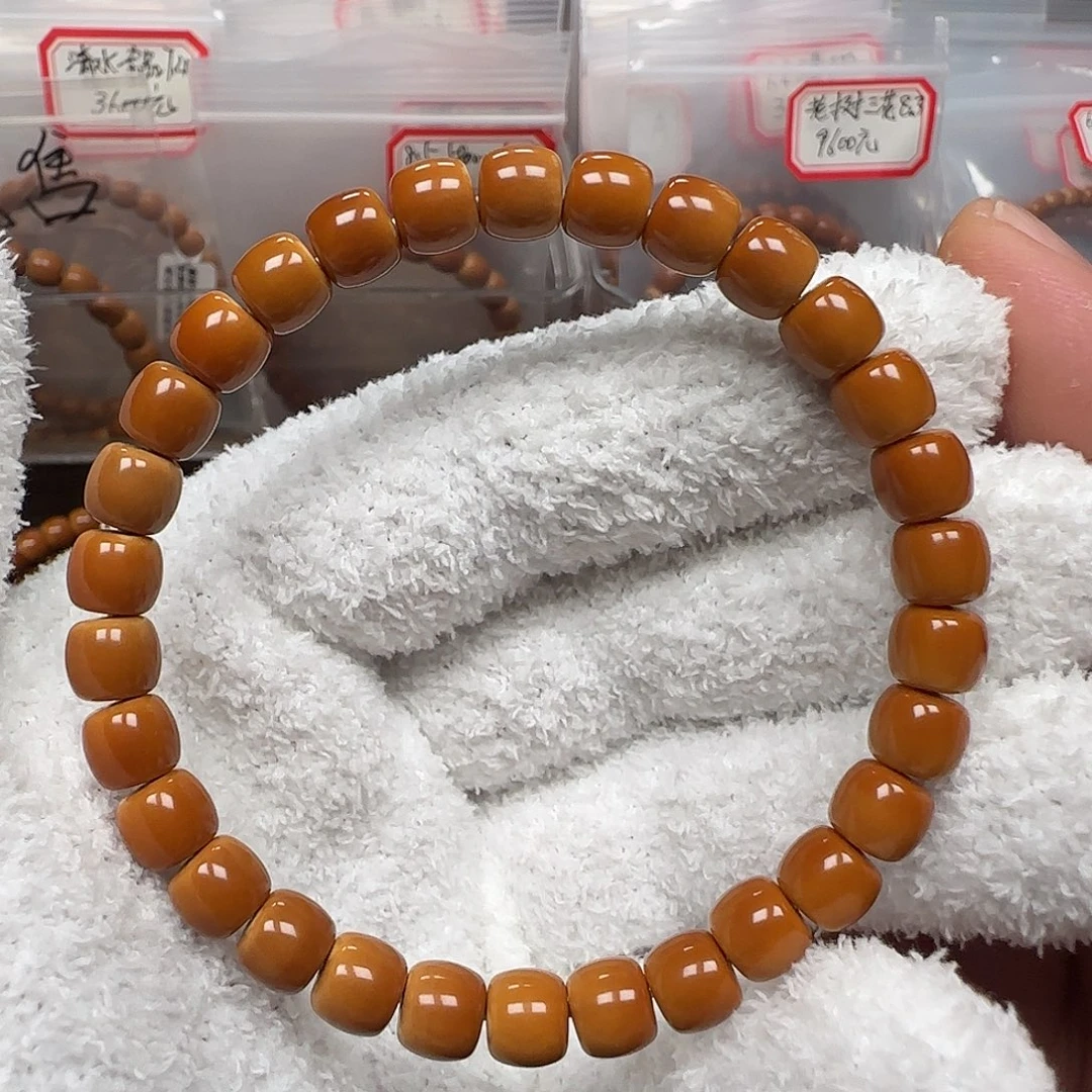 轻***恐橄榄核手串老挝7.6mm三花面无白