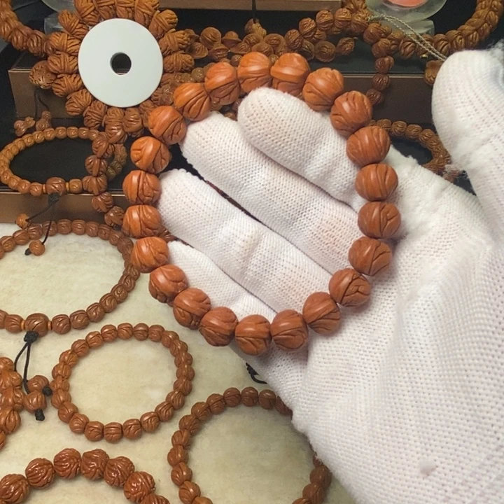 反***色手串桃核秦岭龙纹桃核