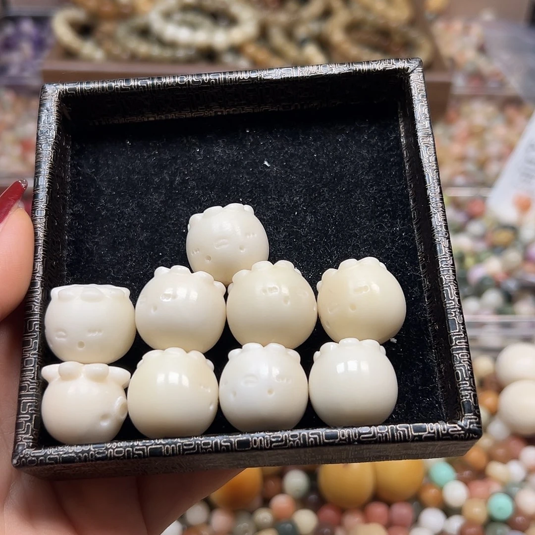 手串菩提根/象牙果瑕疵白章鱼9颗有裂