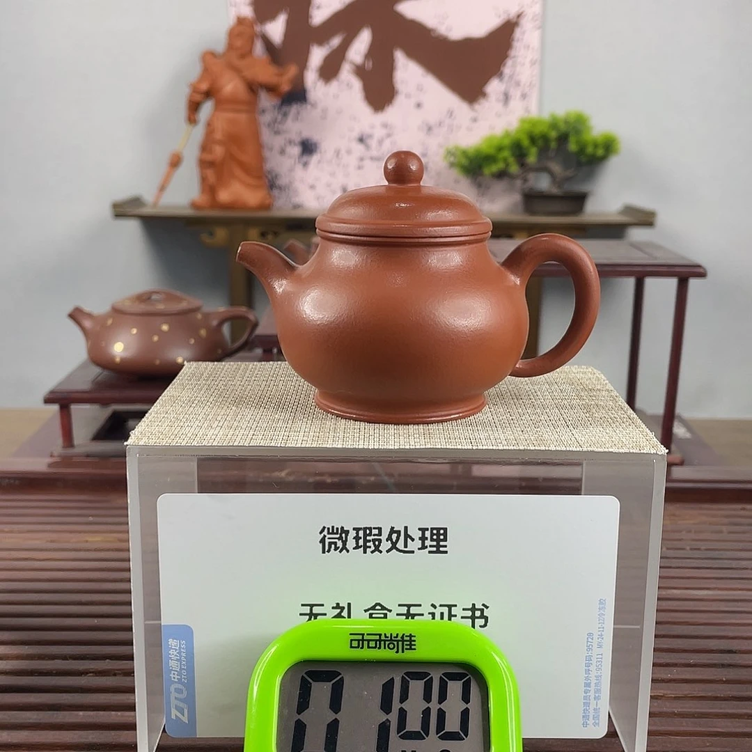 紫砂茶壶小***.这首是他创作