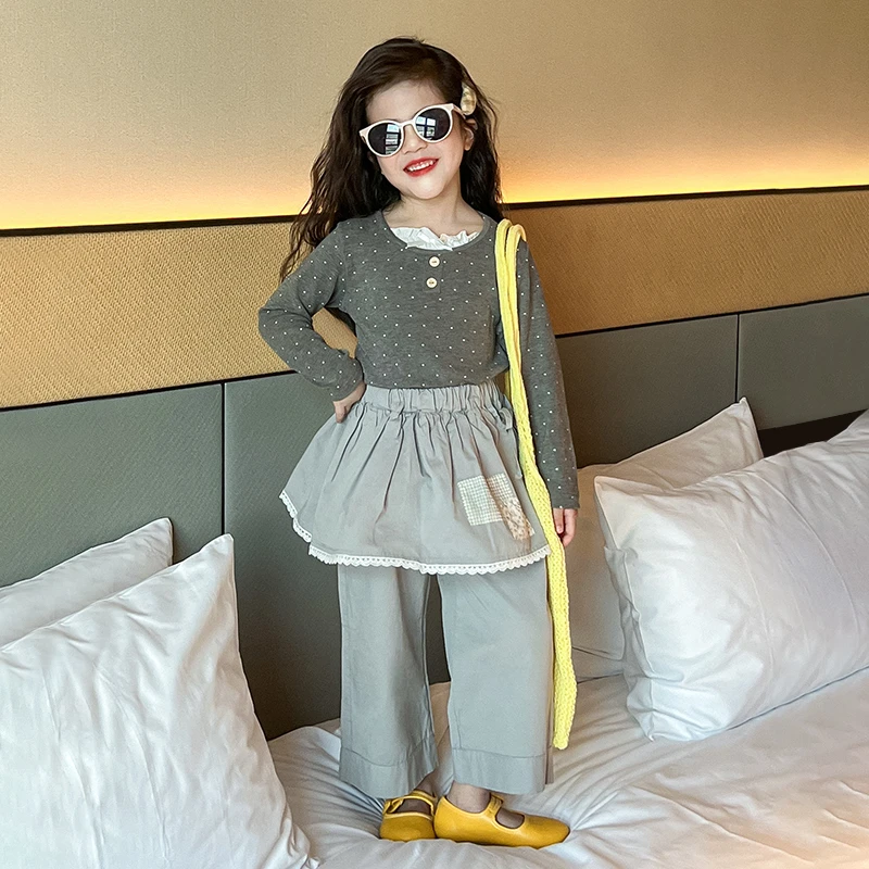 R25024韩版女童假两件波点上衣春季新款花边拼接屁帘宽松直筒裤