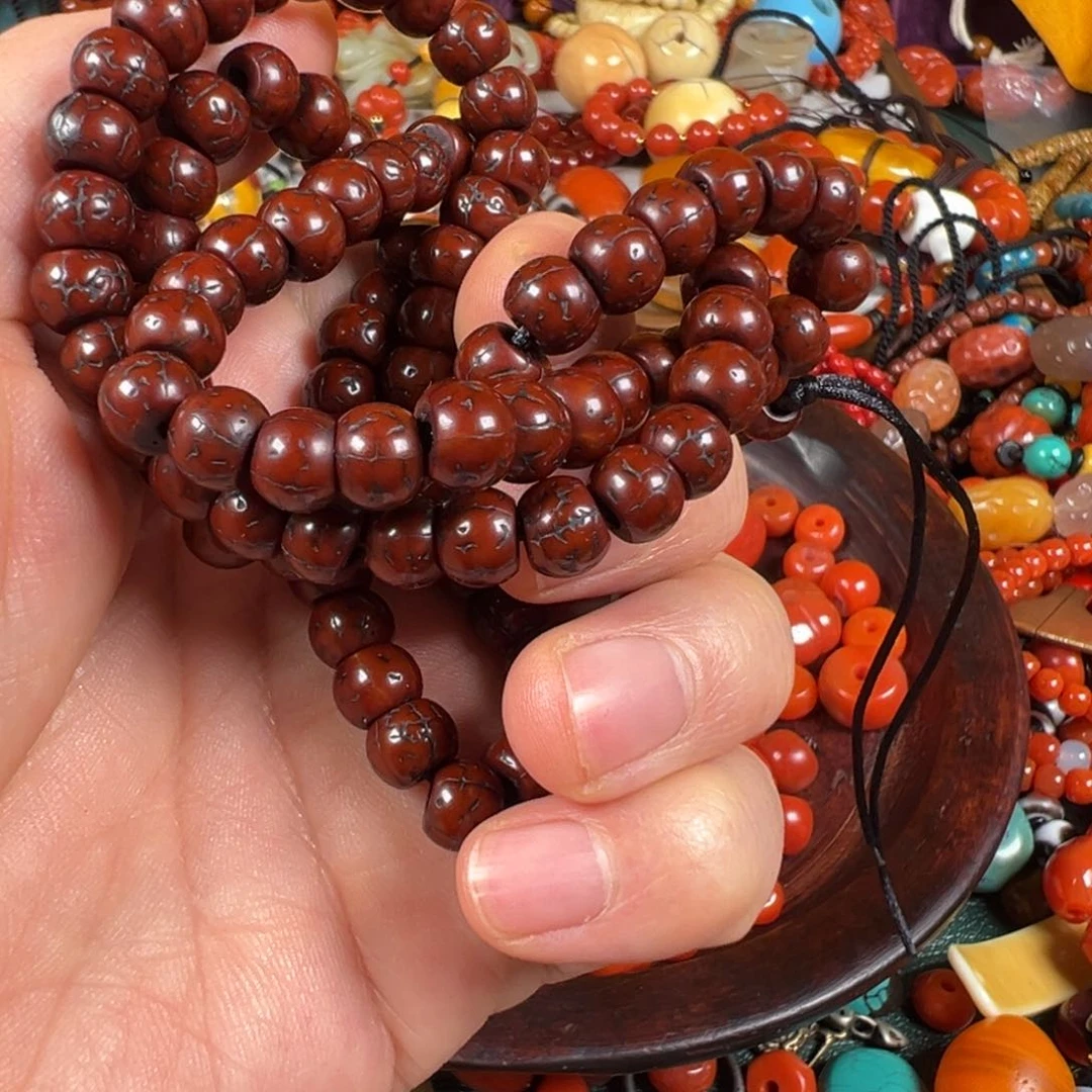 凤眼菩提吊坠胡*男手持