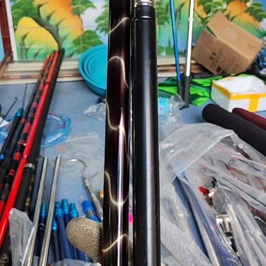 28号微瑕疵抄网杆两根