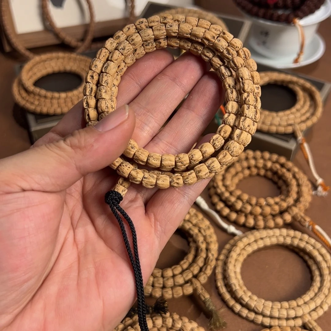 烧***花柏香籽/百香籽吊坠