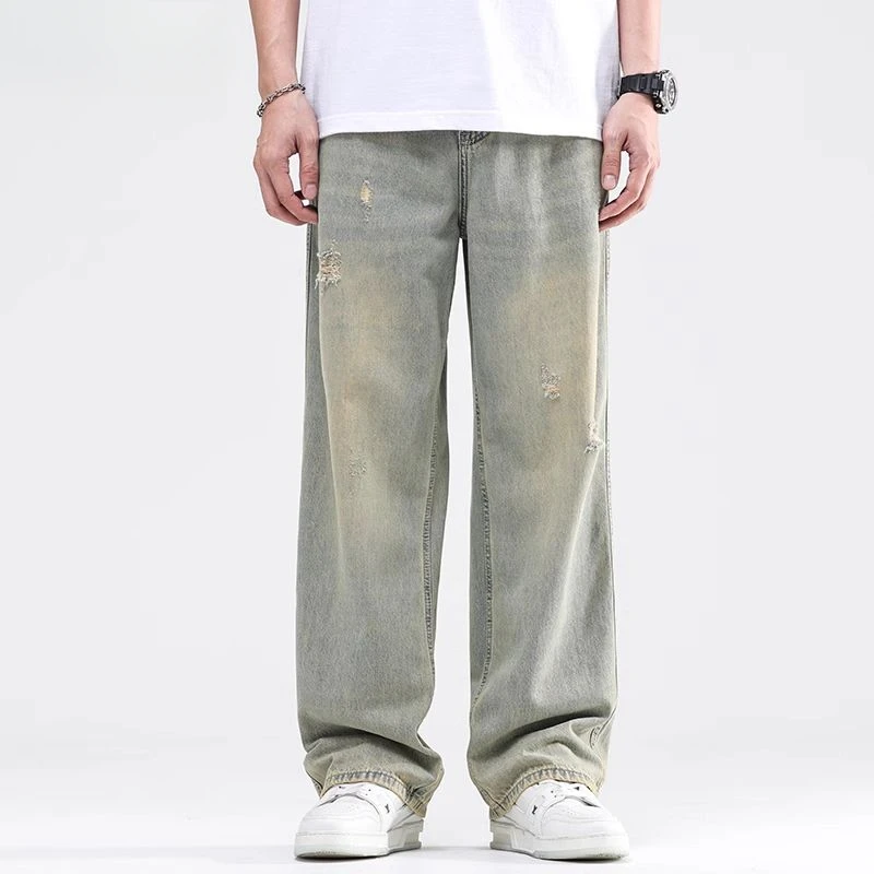 夏季新款黄泥色牛仔裤男款复古潮流重工水洗破洞街头宽松直筒裤子