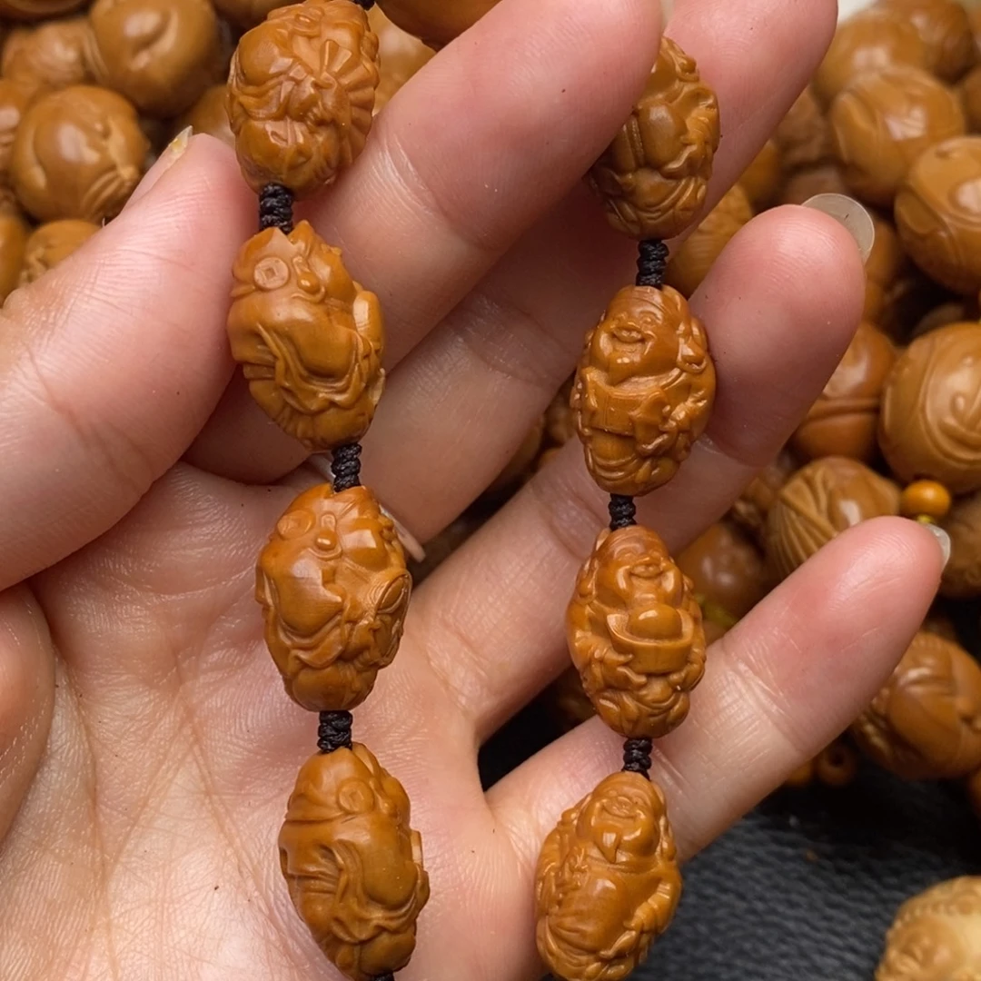 寒***月手串橄榄核小财神