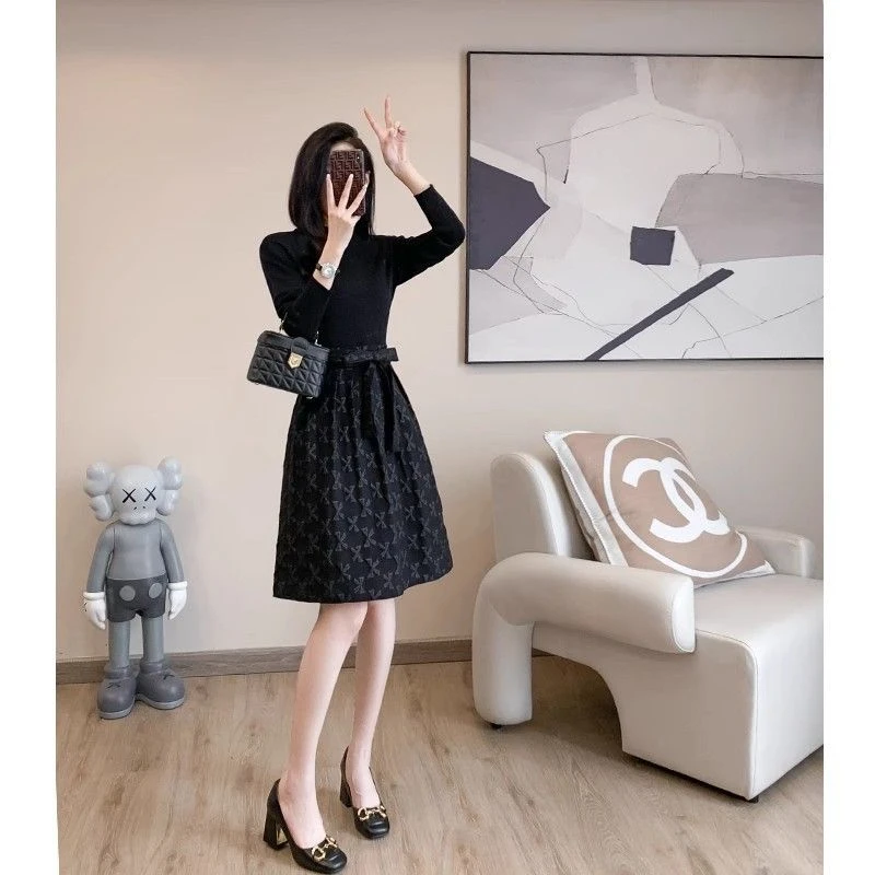 高级感黑色连衣裙女2025年春季新款时尚提花中长款收腰显瘦A字裙