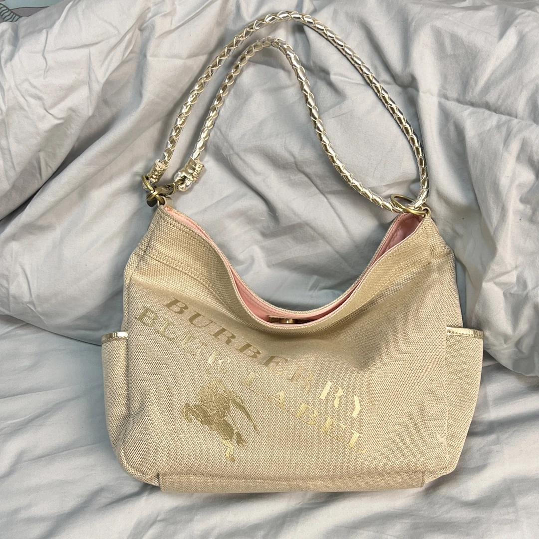 95新 BURBERRY/博柏利 单肩斜挎两用米杏色细闪帆布托特粉金大包