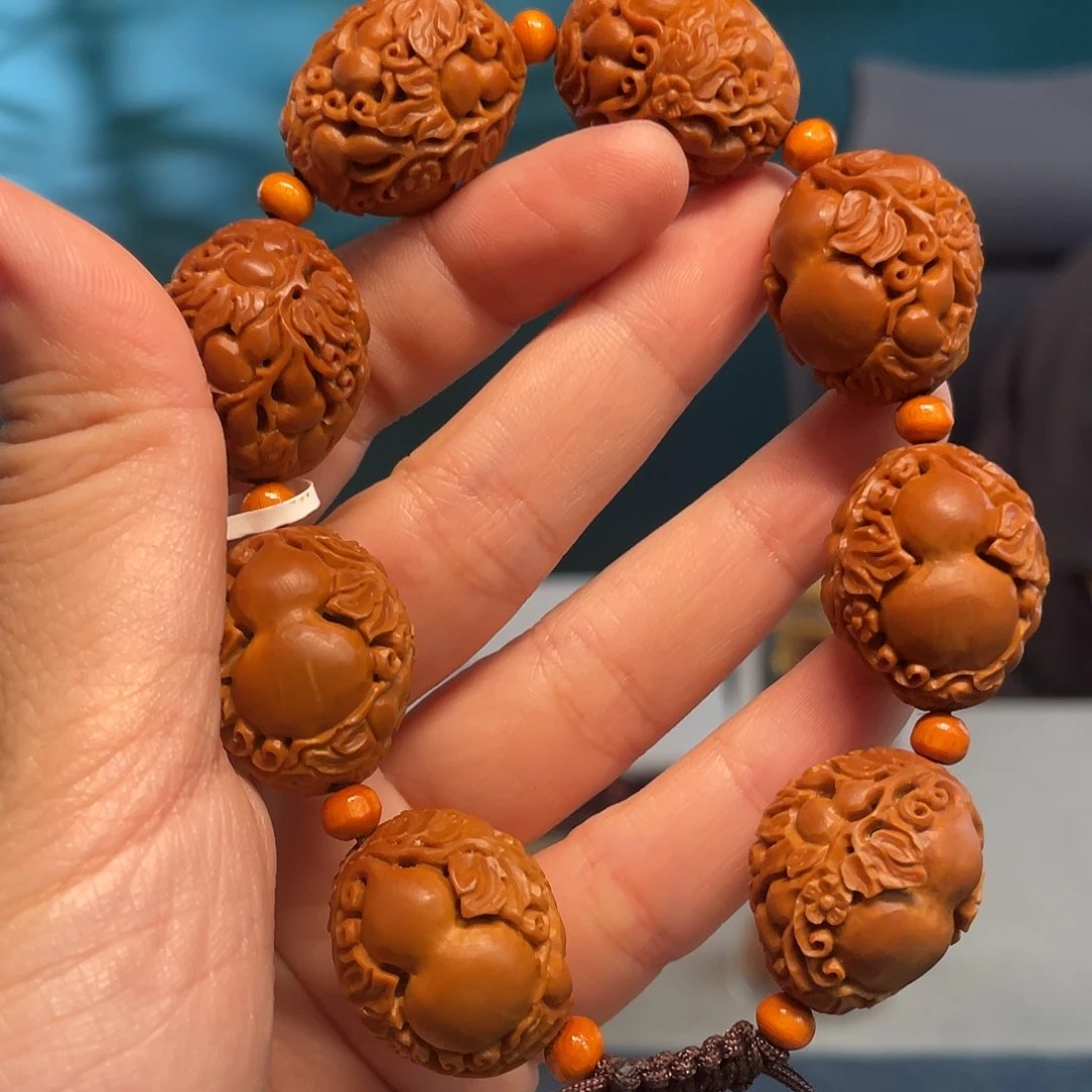 橄榄核葫芦万代核雕作品
