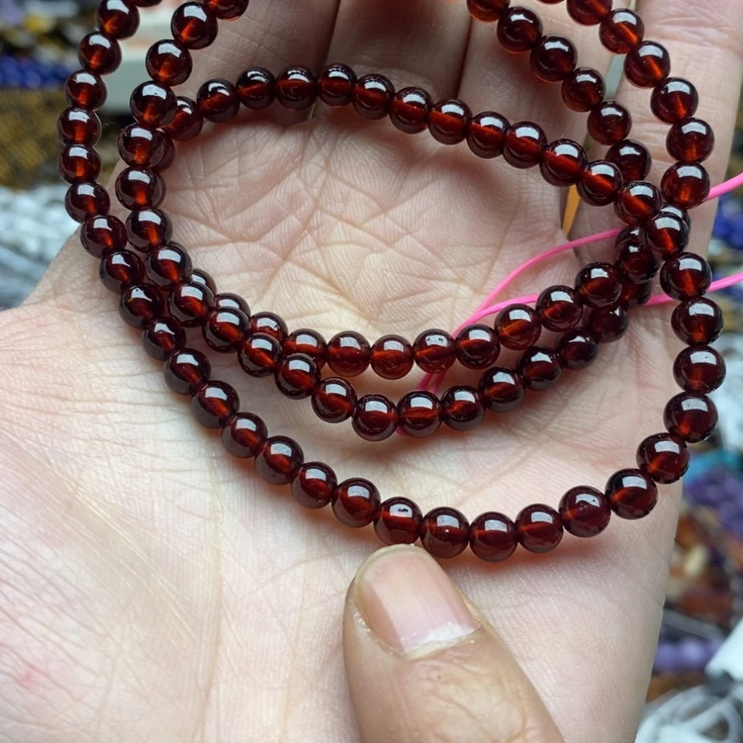 玛瑙/玉髓未镶嵌珠宝半成品一条天然6mm透体酒红石榴石三圈