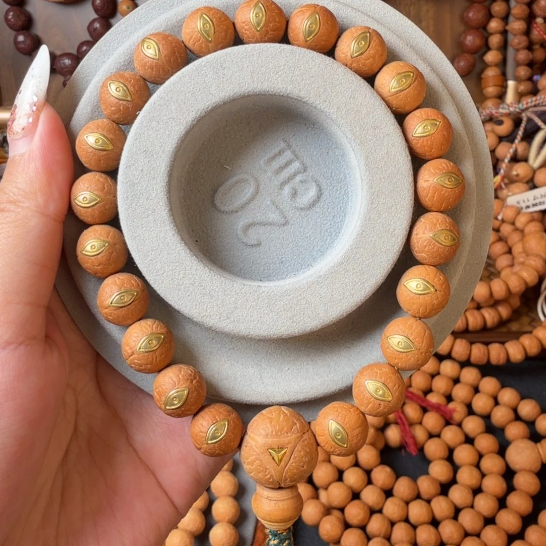 凤眼菩提把件11.5mm/镶嵌法螺眼