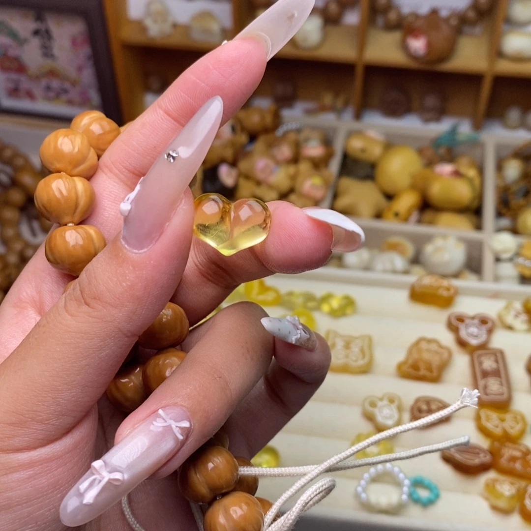 吊坠猴头核桃0.95克爱心