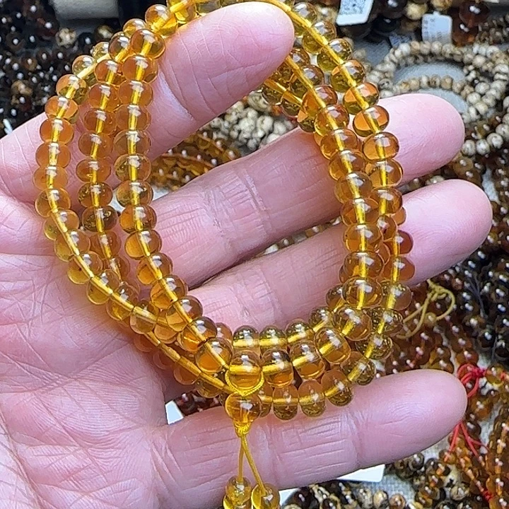 北***司琥珀未镶嵌颈饰抚顺金珀7mm10