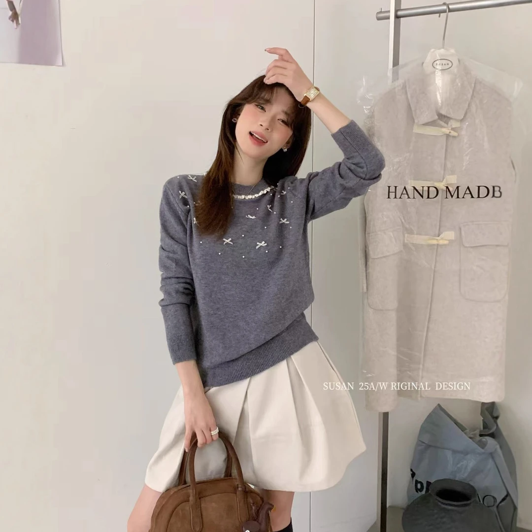苏珊2025秋冬新款韩系高级设计感挂脖重工蝴蝶结针织毛衣女2133S