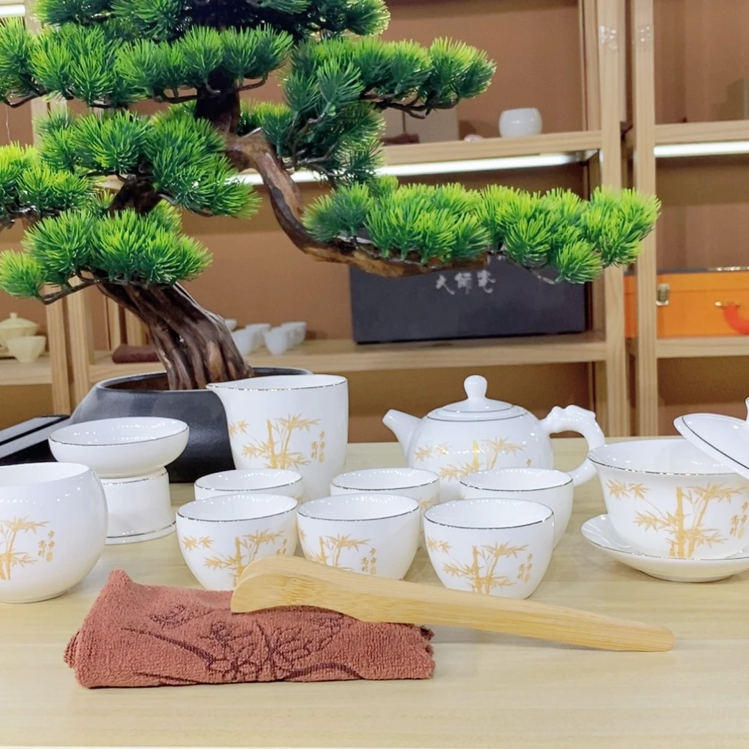 瓷片金竹报喜羊脂玉套装