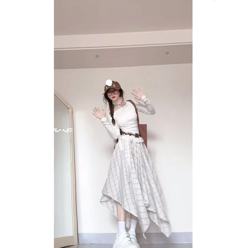 春季款设计感女韩版纯欲辣妹百搭不规则收腰上衣女配显瘦半身裙