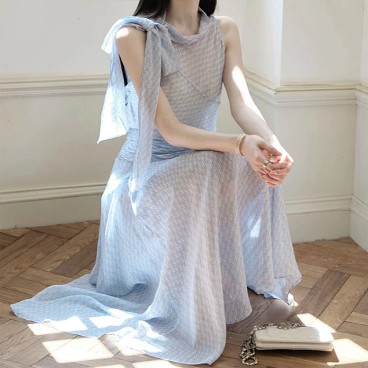 俏佳人 灵动飘逸人丝乔其无袖上衣/A字半身裙套装