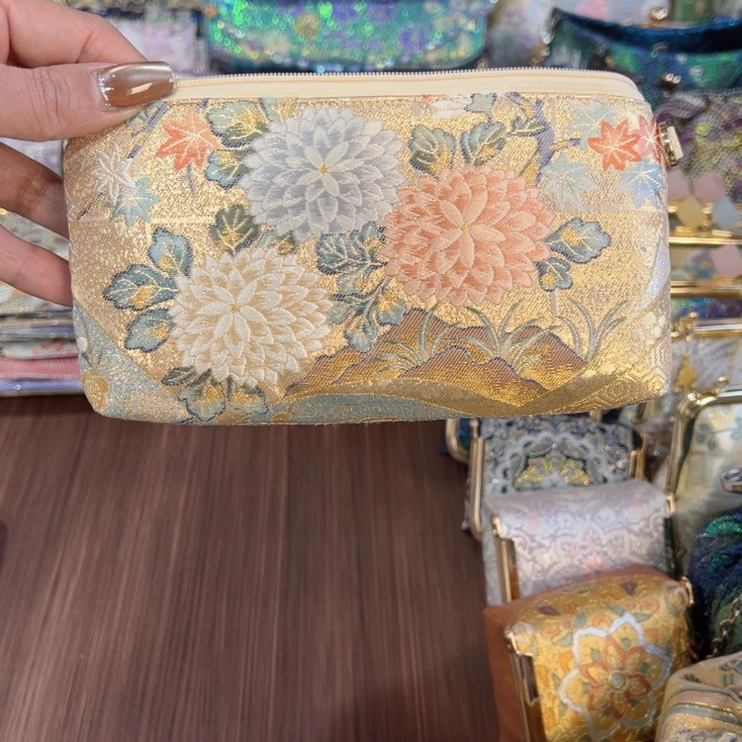 柚***香蚕丝福利花卉拉链现金包