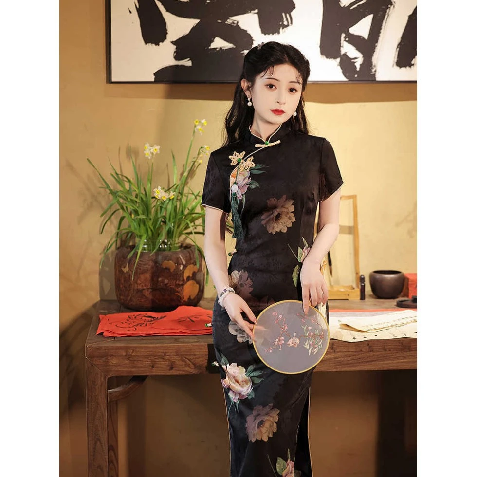 黑色旗袍2025新款夏季改良年轻款少女新中式日常可穿绝美修身长款