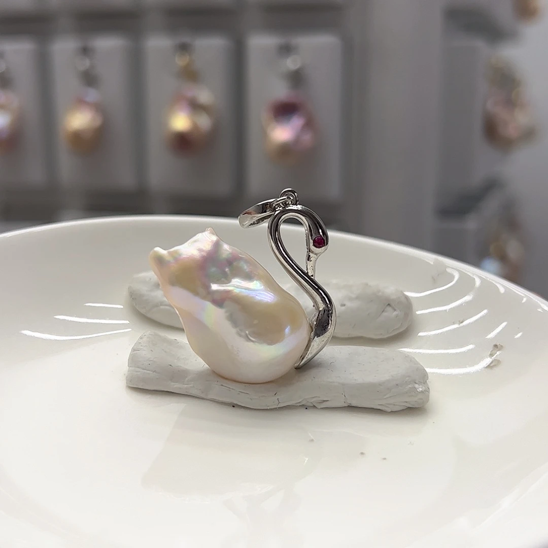 伊***凡耳饰银S925镶嵌淡水珍珠