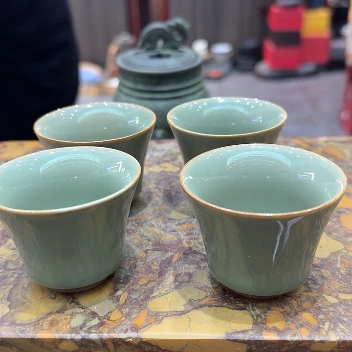 品茗杯四个。。。品茗
