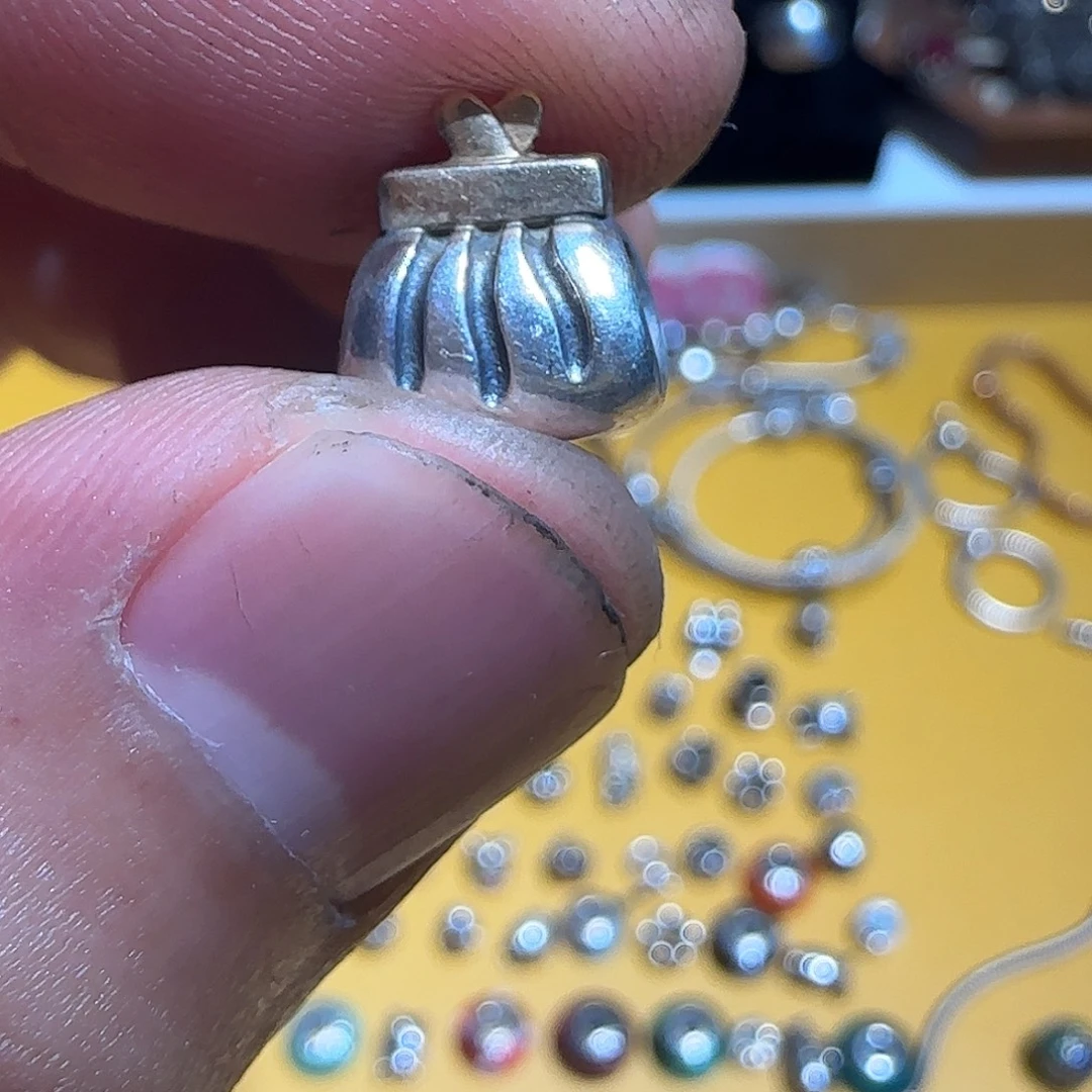 7***7大理石纯铜吊坠的设计很简单