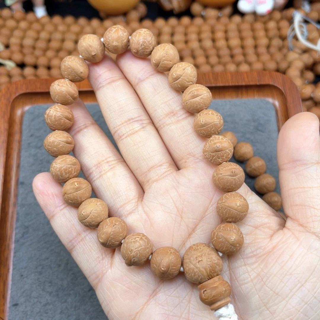 凤眼菩提手串可*?L418-K10凤眼菩提小12+同树黄皮