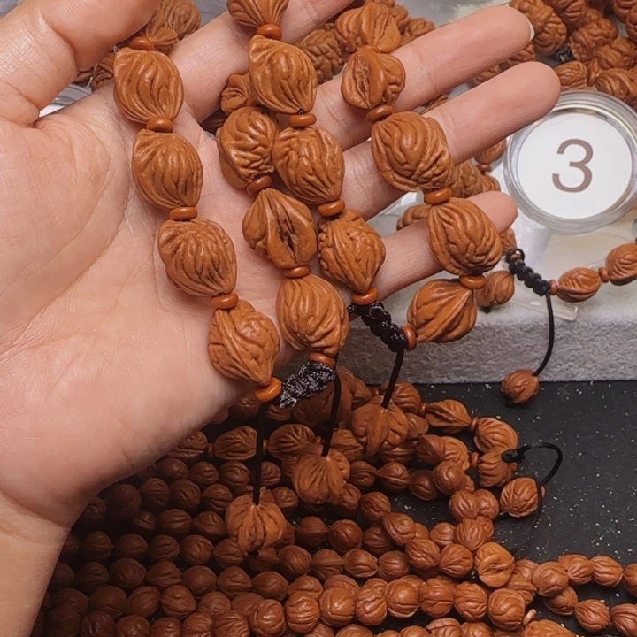 根***缘桃核手串龙纹桃核