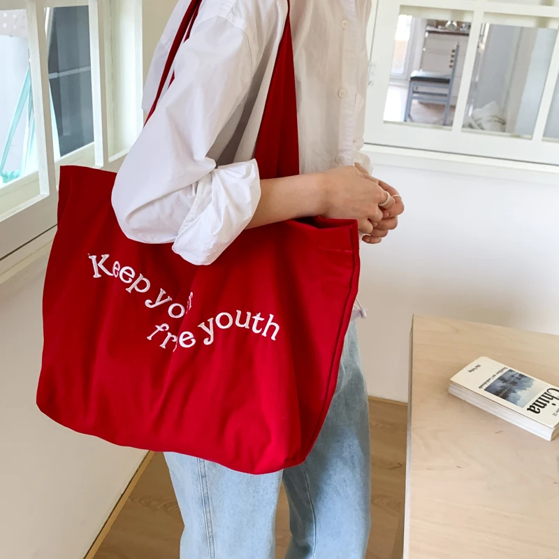 321新款韩系ins风字母帆布托特包时尚潮流通勤百搭大容量单肩包